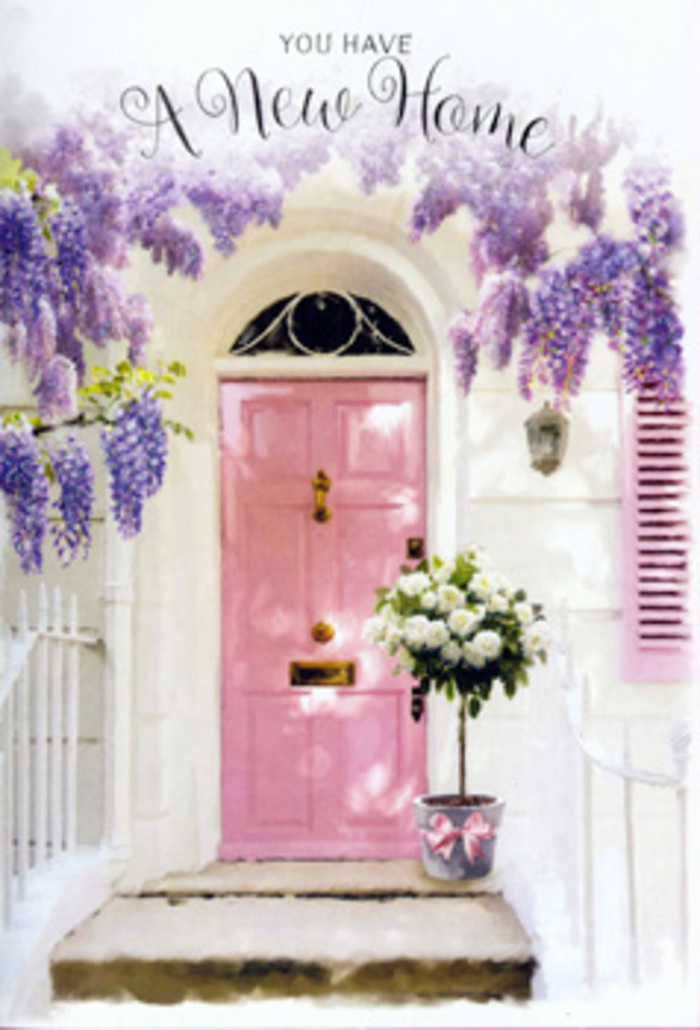 In this softly lit entrance scene, a Cheam doorway is turned into a poetic celebration of homecoming. The focal point is a painted pink front door, its blush tone subtle yet uplifting, caught somewhere between rose and shell, and finished with a smooth, almost chalky texture that absorbs the light rather than glaring back. Flanking and crowning the door, white walls provide a quietly elegant backdrop. From above, wisteria drapes down in generous, trailing strands, their blossoms shaded in lavender, mauve, and powdery purple, evoking the grace of springtime walks through the grounds of nearby Nonsuch Park. Each flower cluster hangs like a small, fragrant chandelier, creating a sense of intimacy around the threshold. Resting at the base of the door, positioned just off-centre on the step, is a sturdy grey metal bucket recycled cleverly into a floral container. From it spills a wonderfully full arrangement of white and cream roses, their petals layered densely in soft spirals. These blooms are at that perfect moment of openness-wide enough to feel abundant, yet still holding shape and poise. Between them, tufts of fresh green foliage add a lively, natural texture, hinting at stems freshly cut from a Cheam garden after a morning of careful tending. A blush-pink ribbon is tied around the bucket in a loose but considered bow, its satin sheen catching the light and tying together the palette of pinks that run from the door to the flowers. The light is gentle, perhaps late afternoon, and fine shadows lace across the step and lower door panels. The atmosphere is deeply reassuring and hopeful, a visual story of new beginnings-a style of arrangement perfectly suited for delivering warm housewarming wishes throughout Cheam's tree-lined streets.